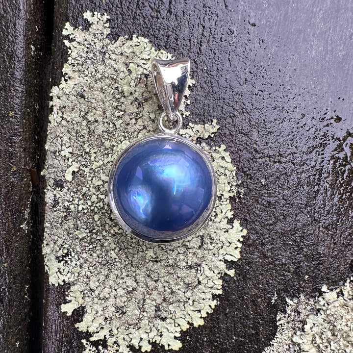Peacock mabe pearl pendant