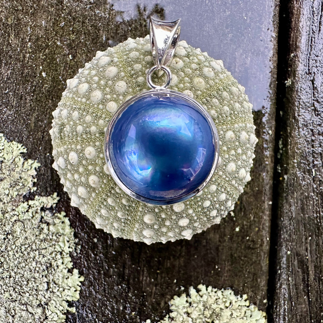 Peacock mabe pearl pendant