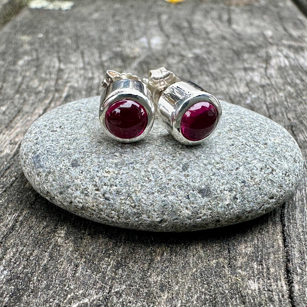Lab grown ruby studs