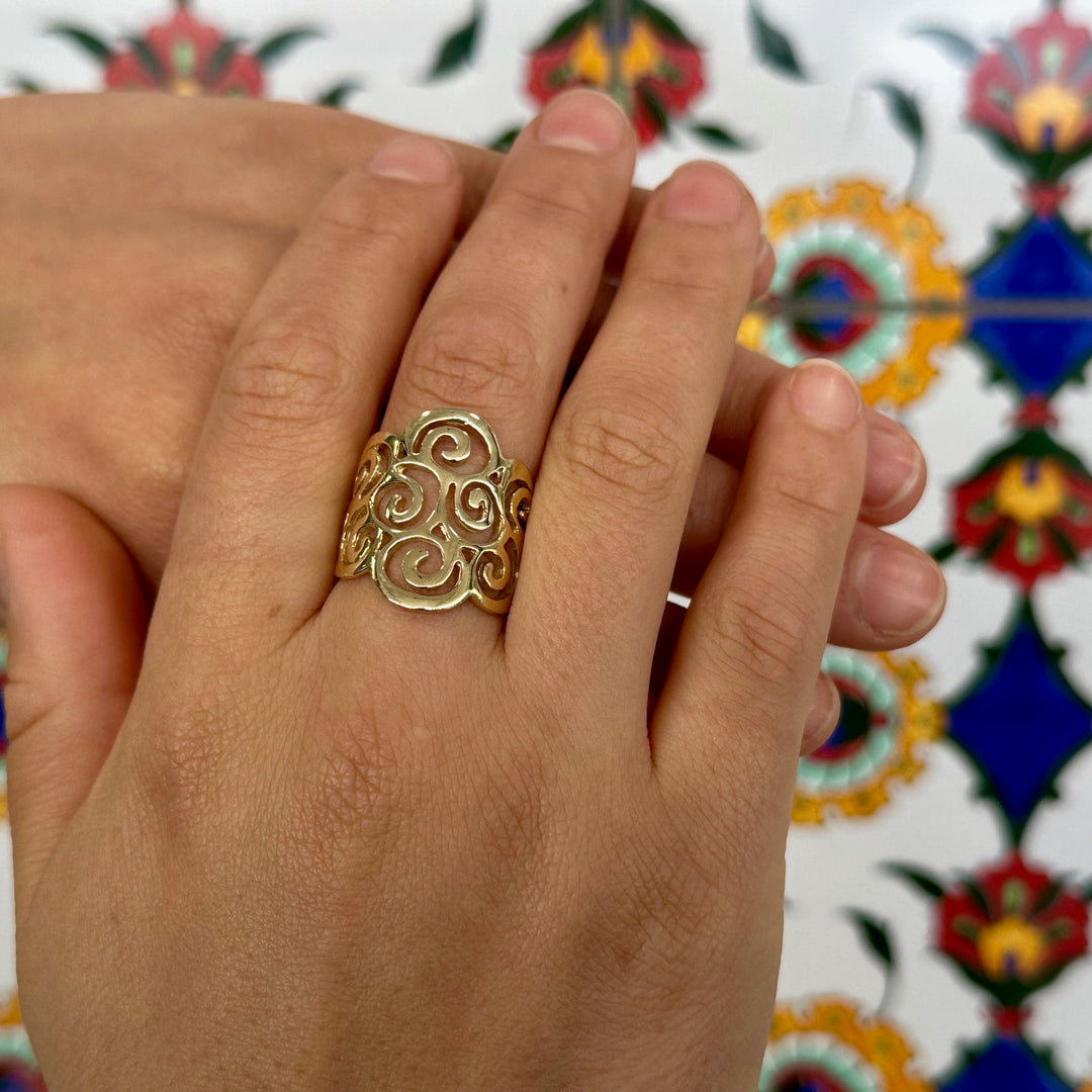 Koru swirl ring in 9CY gold