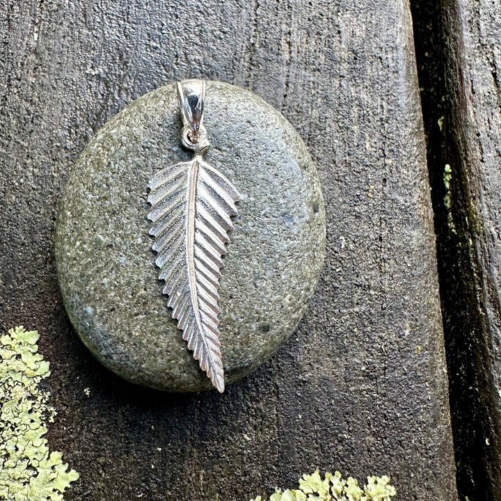 silver fern pendant