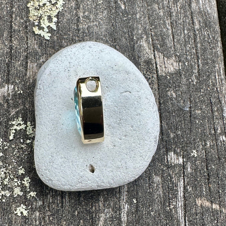 5.95 ct Blue topaz slider pendant in 9 ct yellow gold