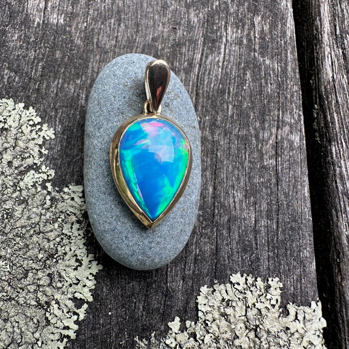 5.36 Ethiopian opal pendant in 9ct yellow gold