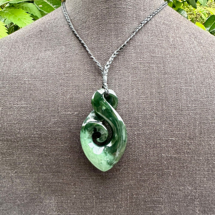 Marsden flower rau kumara koru