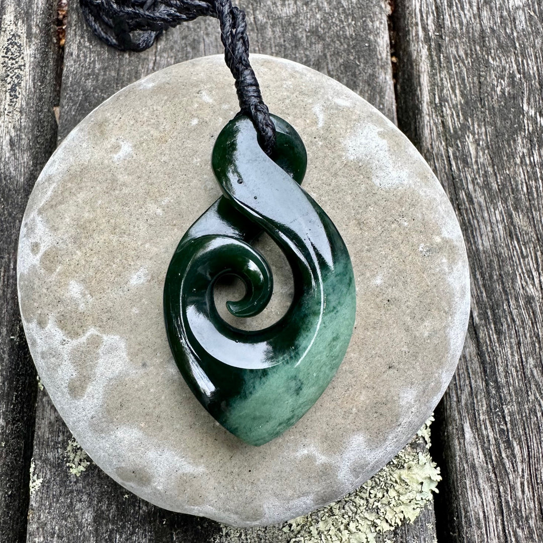 Marsden flower rau kumara koru