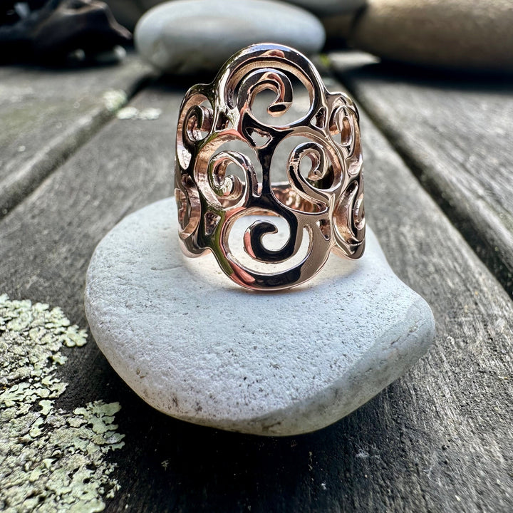 Koru swirl ring in 9 carat rose gold