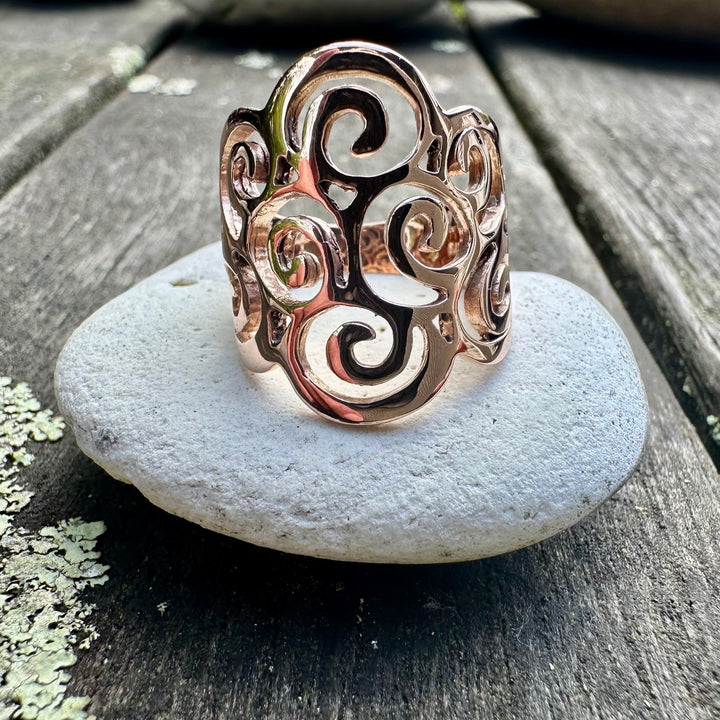 Koru swirl ring in 9 carat rose gold