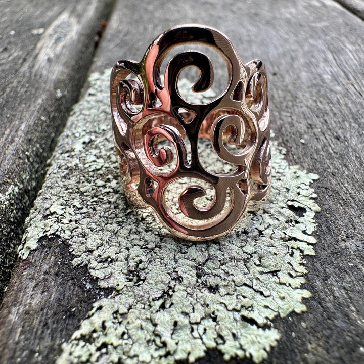 Koru swirl ring in 9 carat rose gold