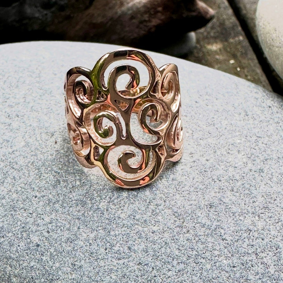 Koru swirl ring in 9 carat rose gold