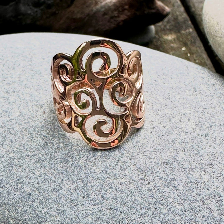 Koru swirl ring in 9 carat rose gold