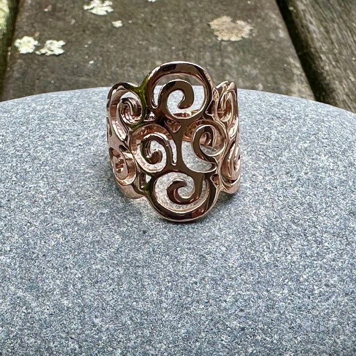 Koru swirl ring in 9 carat rose gold