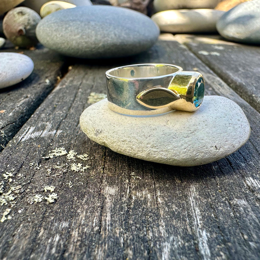 Faceted swiss blue topaz Amore ring