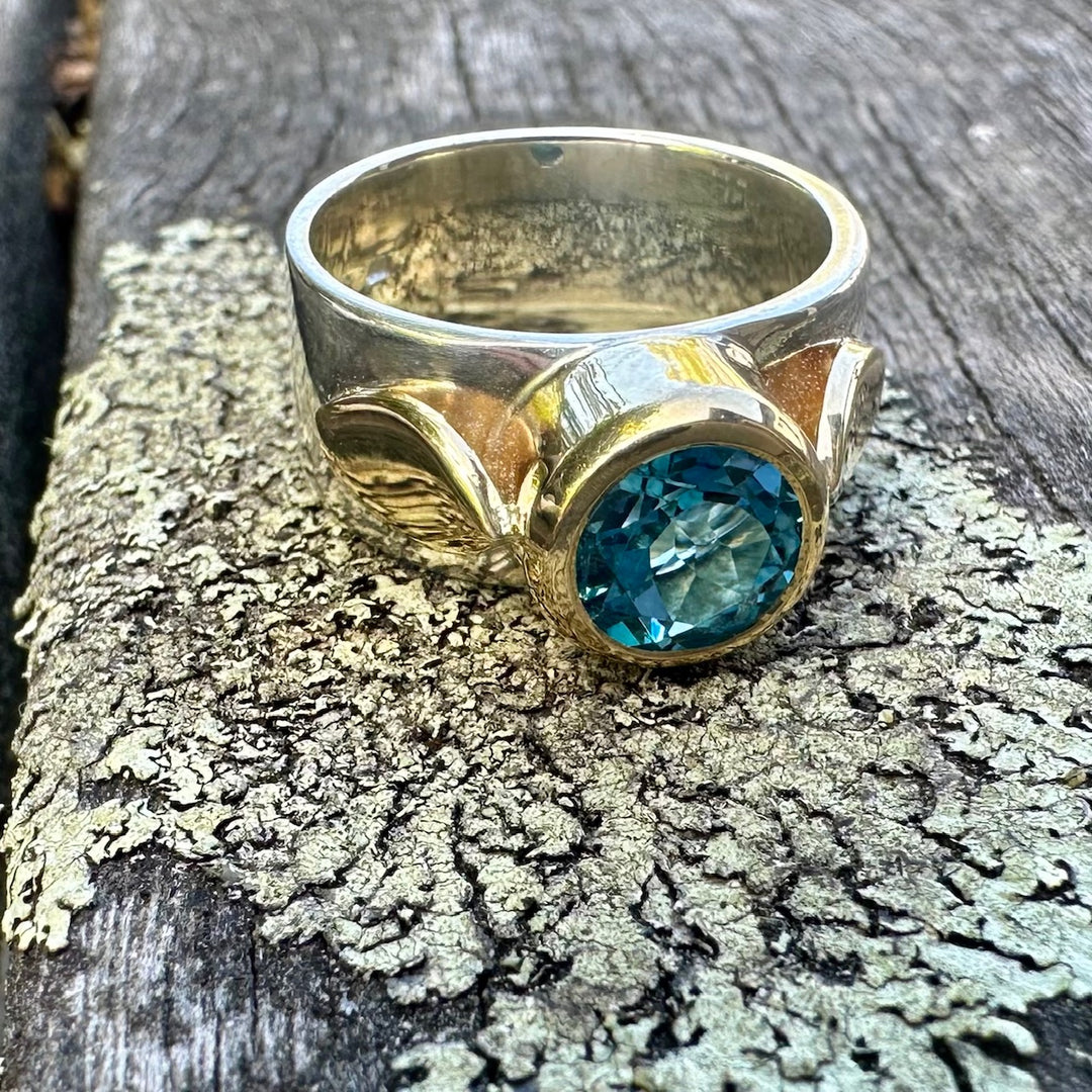 Faceted swiss blue topaz Amore ring