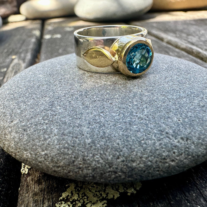 Faceted swiss blue topaz Amore ring