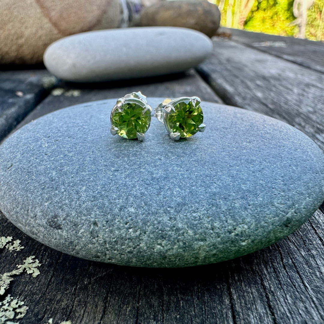 Faceted peridot studs in sterling silver