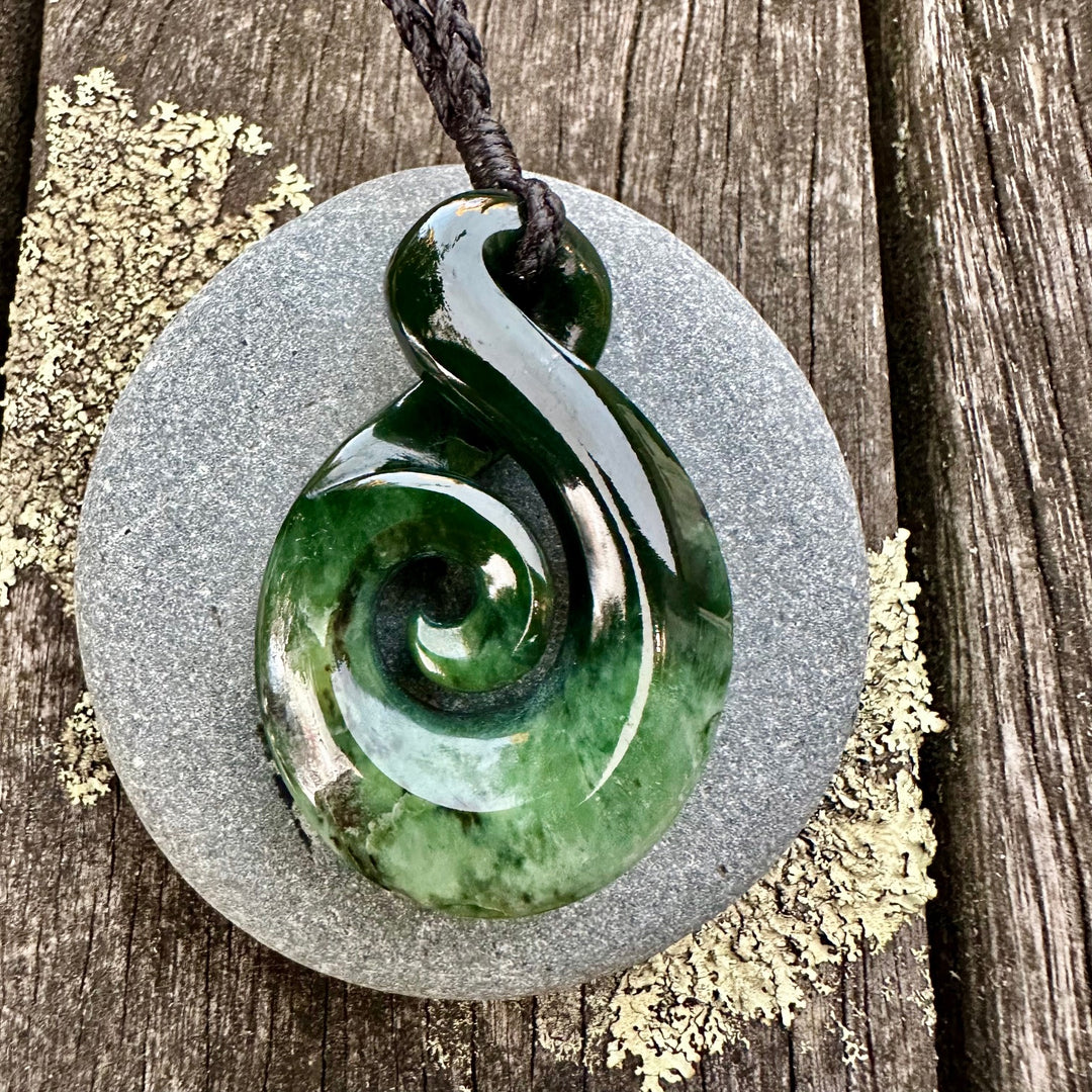 Marsden flower rau kumara koru