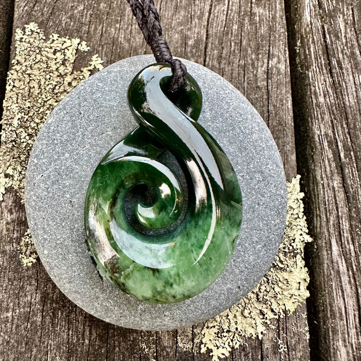 Marsden flower rau kumara koru