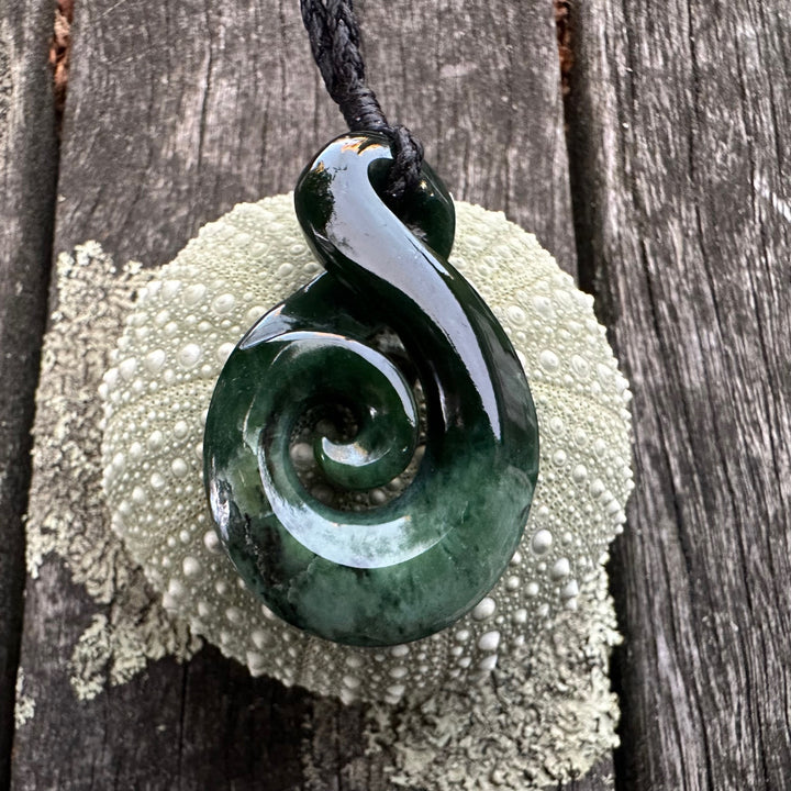 Marsden flower rau kumara koru