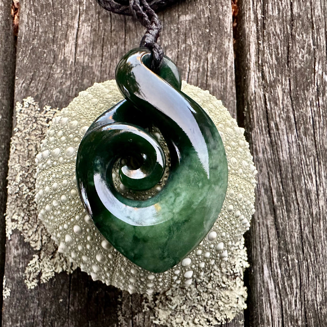 large rau kumara koru