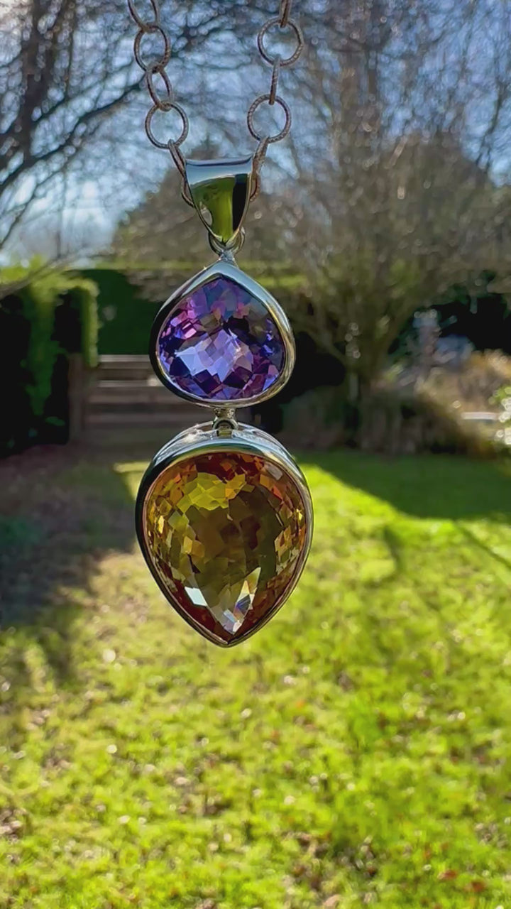 41.34ct citrine & amethyst pendant