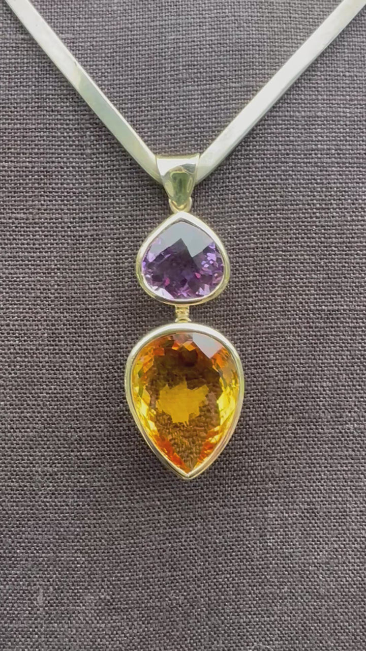 41.34ct citrine & amethyst pendant