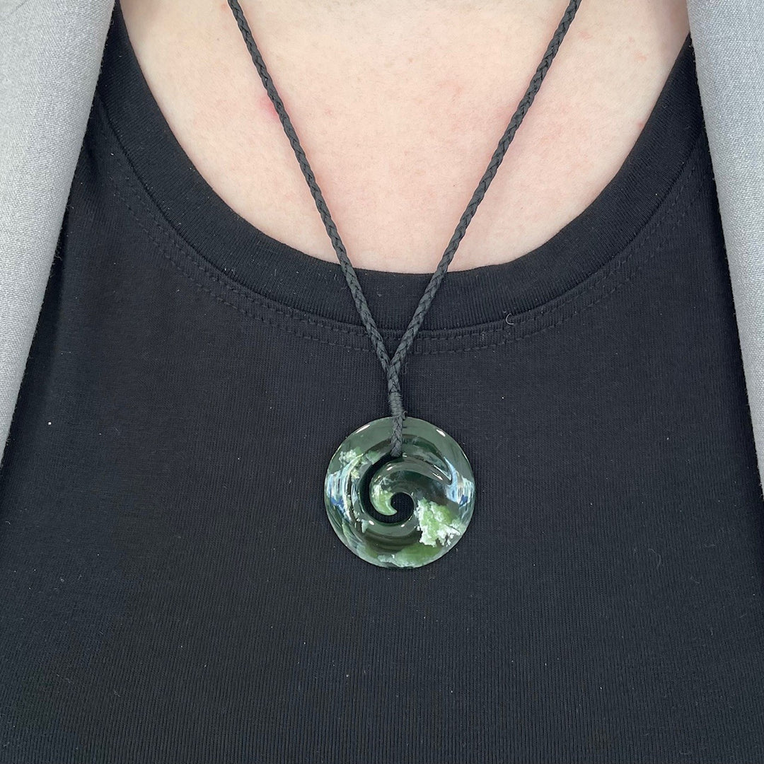 Small New Zealand greenstone koru