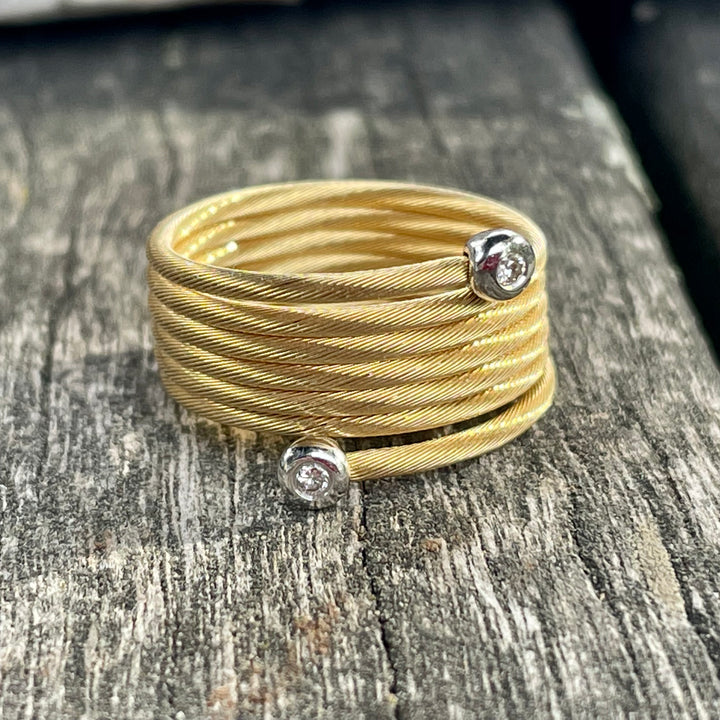 18 carat gold and diamond spiral ring