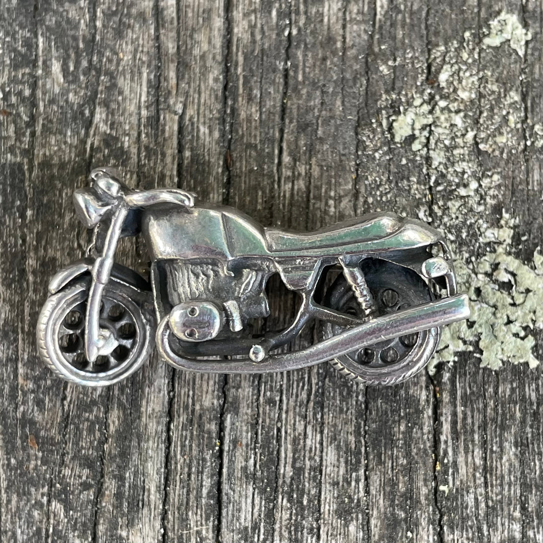 Vintage sterling silver motorcycle brooch